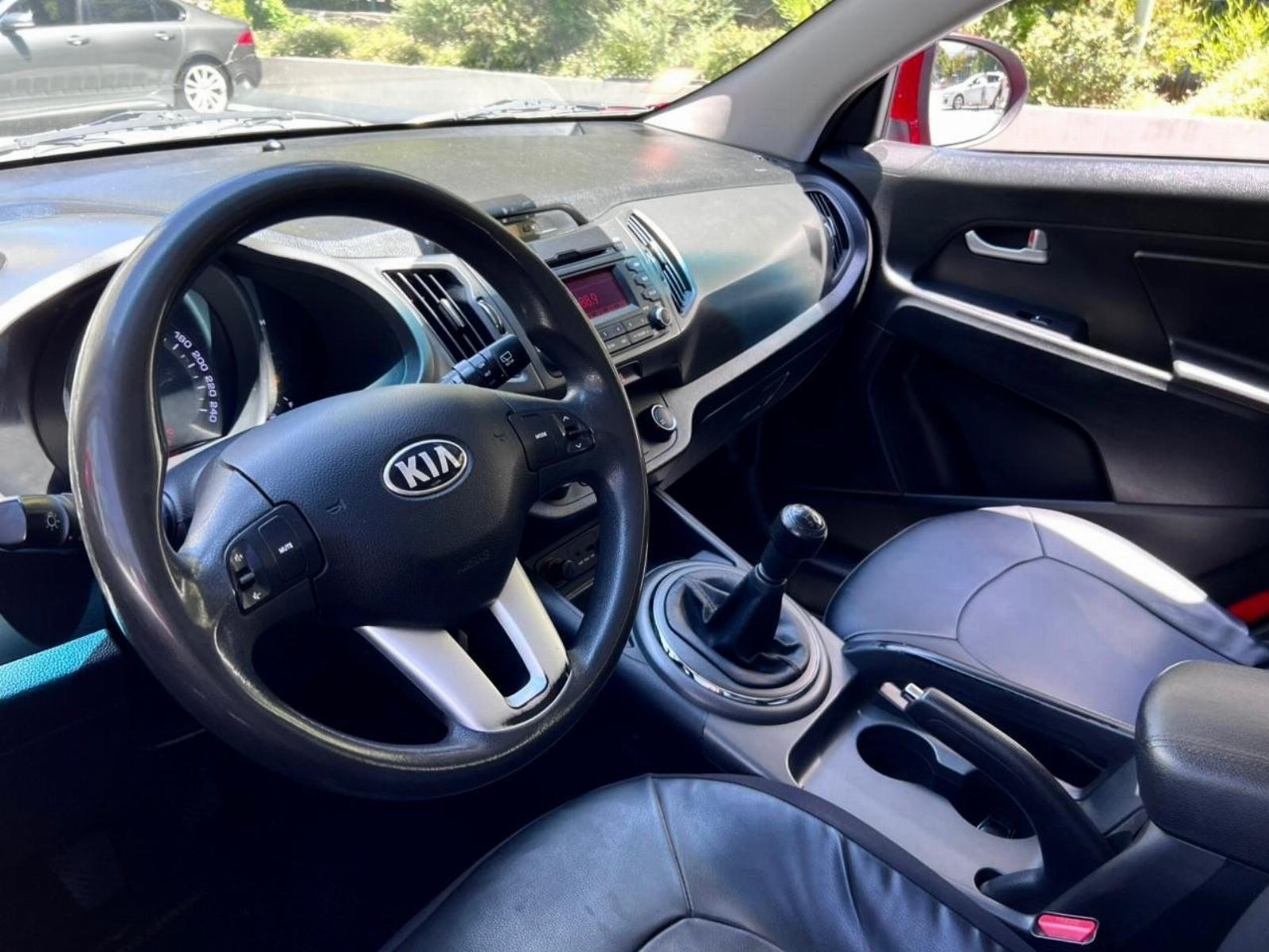 KIA Sportage — foto 12 de 16