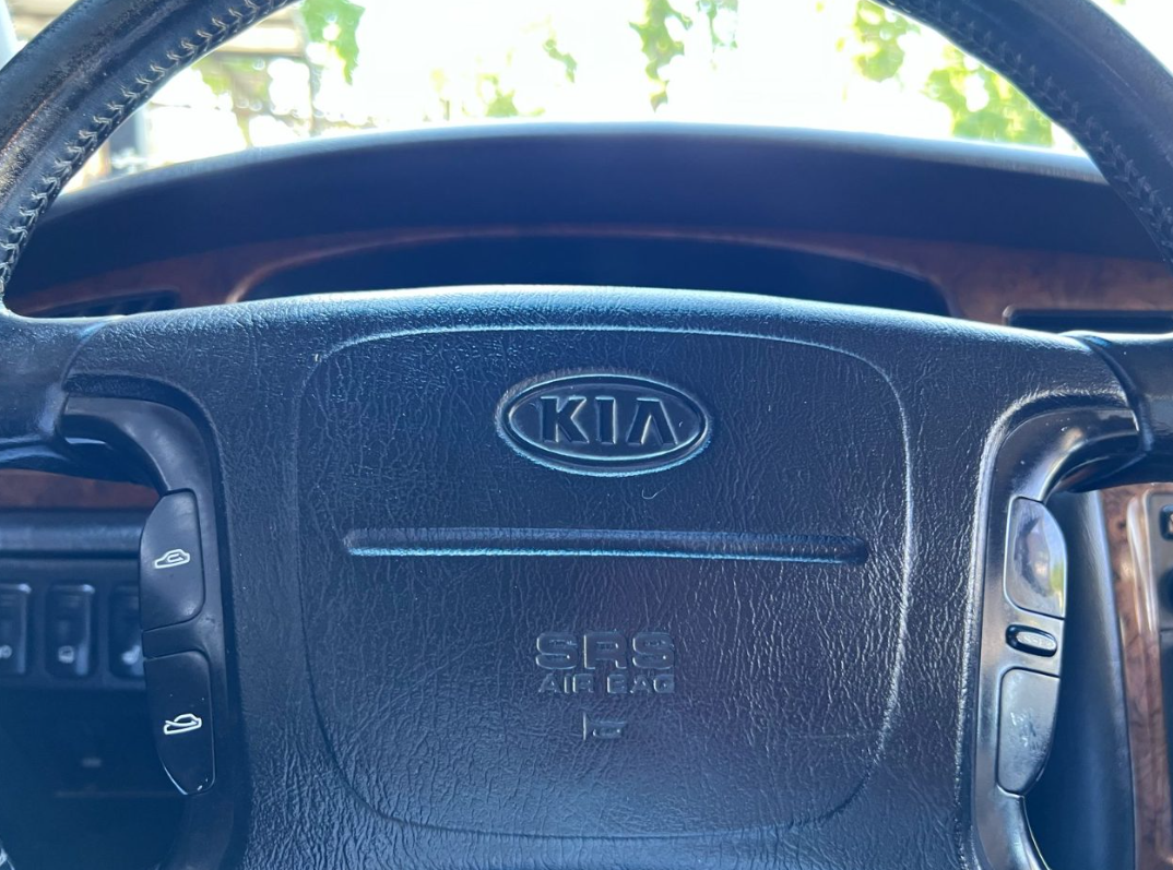 KIA Emterprise — foto 8 de 12