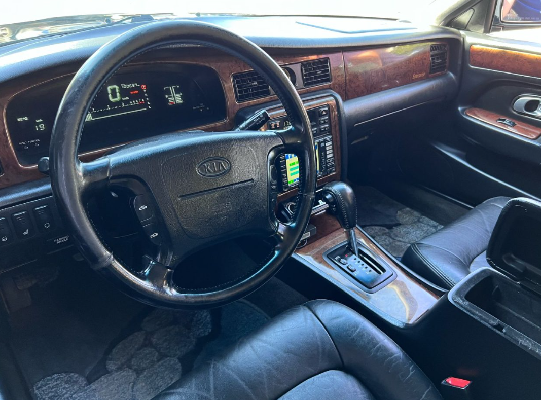 KIA Emterprise — foto 6 de 12