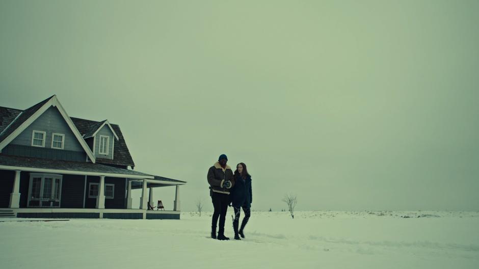 Dolls and Wynonna talk while walking through the snow away from the mansion.