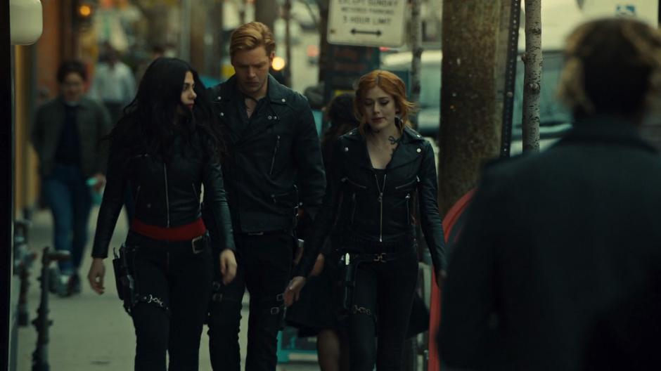 Clary gives herself a hard time about not seeing the truth about Jonathan while Izzy and Jace walk with her.