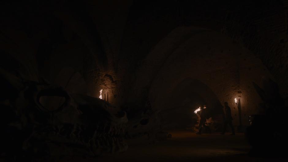 Bronn leads Jaime through the dungeon on the pretense of a training session.