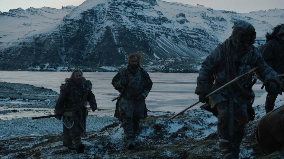 Tormund continues to bug Clegane as they walk away from the frozen lake.