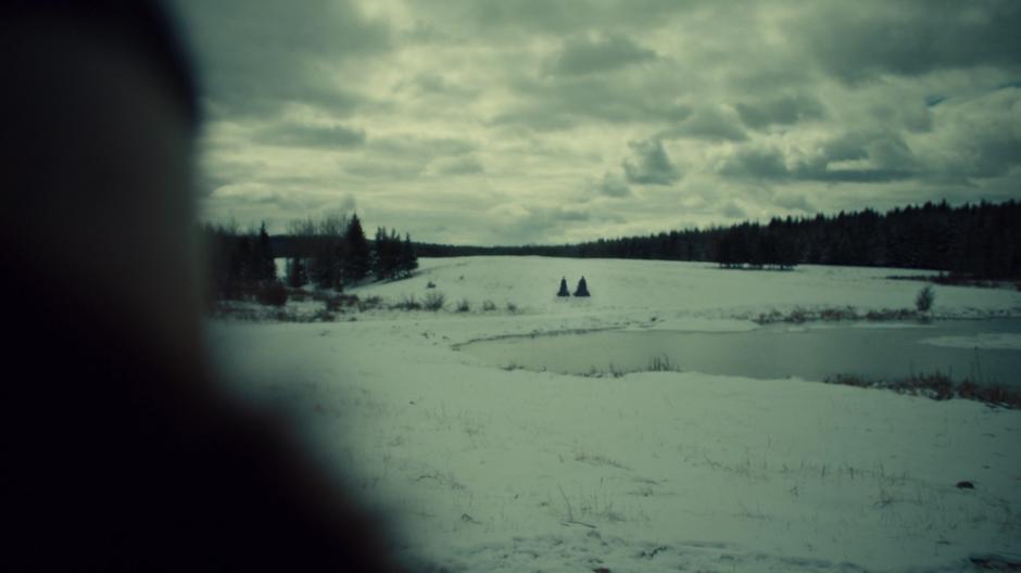 Bobo sees the two Widows traveling across the snow towards him.