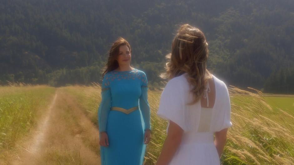 Kara approaches the vision of her mother.