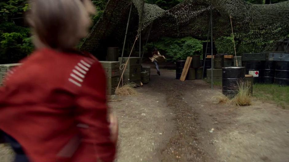 Thea runs after Samantha as she runs after her son.