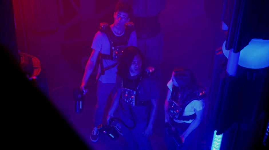 Barry, Cisco, and Caitlin stand in the middle of the arena after losing the game.