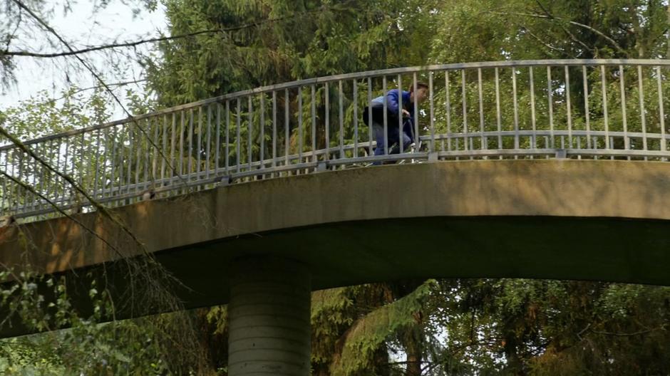 One of the bullies chasing Ray bikes around a spiraling walkway.