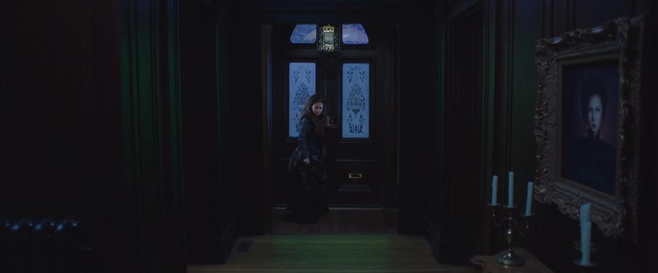 Elle looks back after being unable to escape the mansion. *The front door of this location was composited into the front hall of the [Vincent Massey Mansion](/locations/813).*