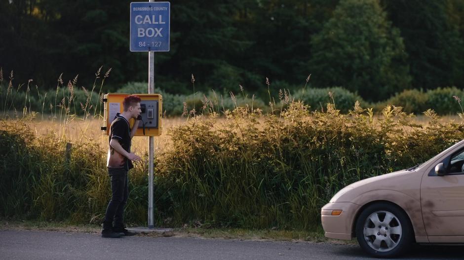 Scott Boreton calls from an emergency call box on the side of the highway.