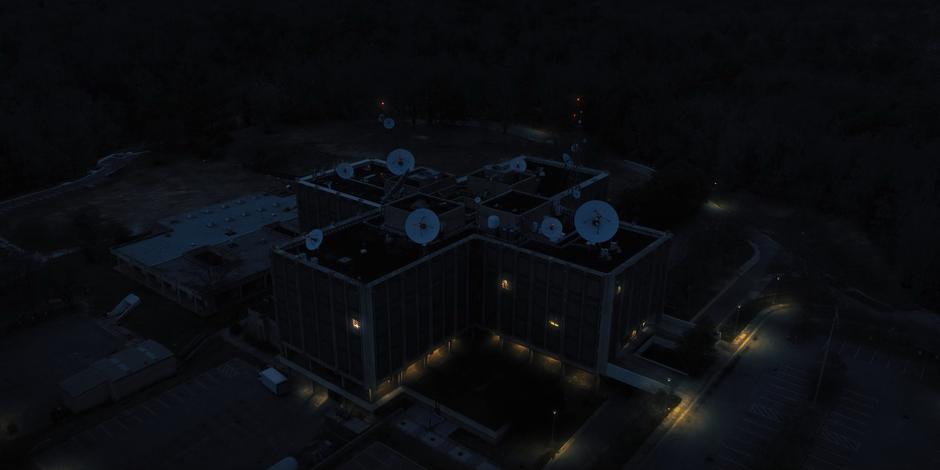 Nighttime aerial establishing shot of the lab.