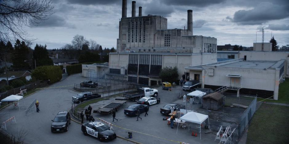 The police investigate the building.