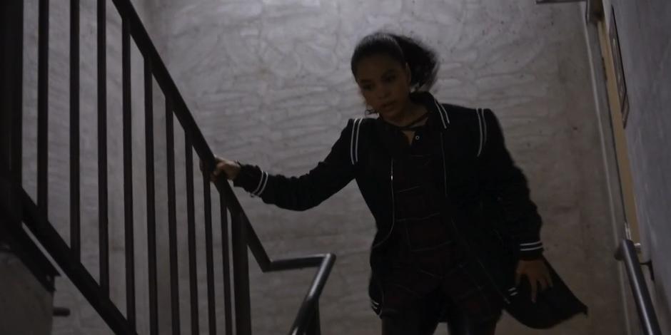 Carly runs down the stairs.