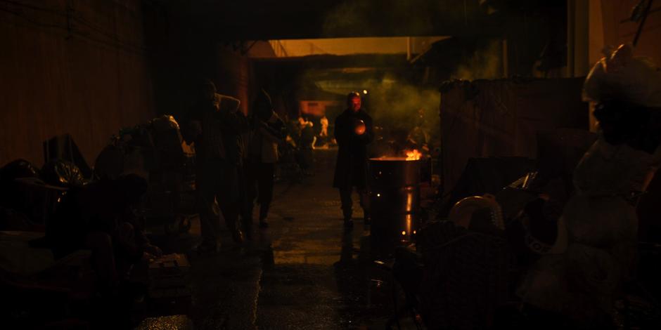 Eleven sees an alley filled with homeless people in her vision while searching for Kali.