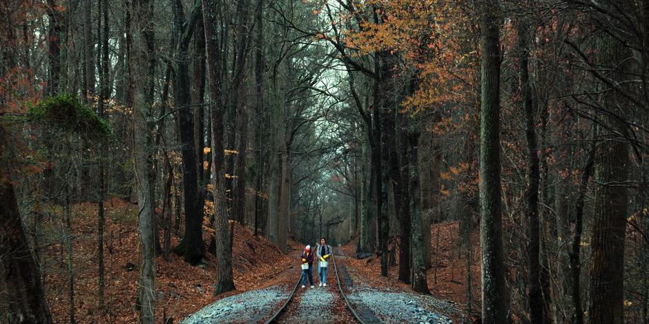 Dustin and Steve talk while leaving a trail of meat down the tracks.