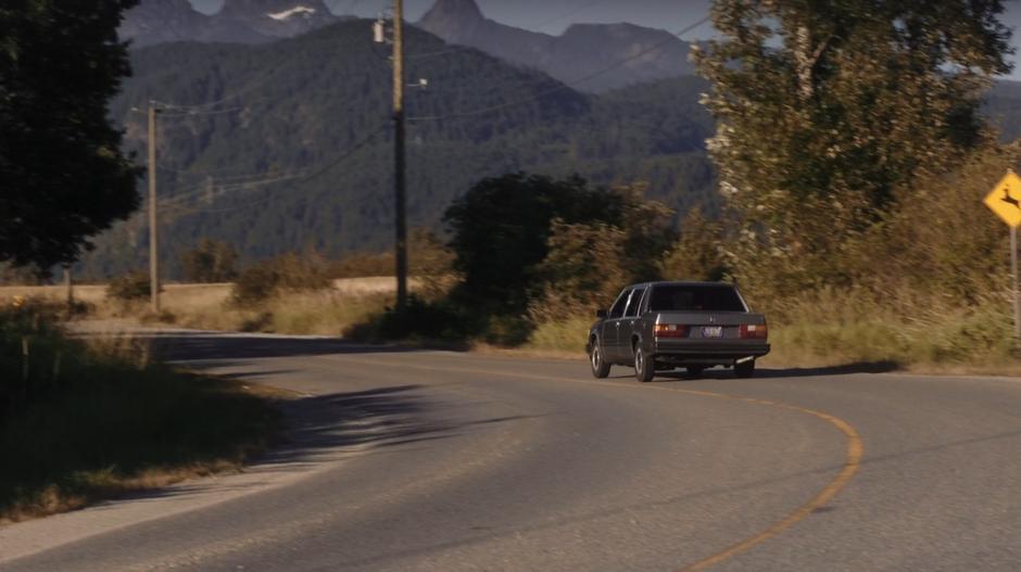 Farah drives the stolen car out of town with Todd and Dirk.