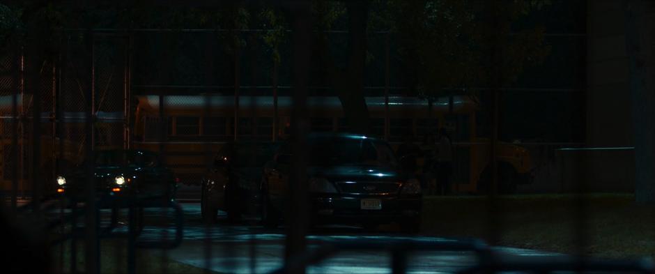 Adrian Toomes drives Liz and Peter up to the school for the dance.