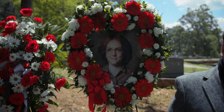 Barb's picture sits in a wreath during the funeral.