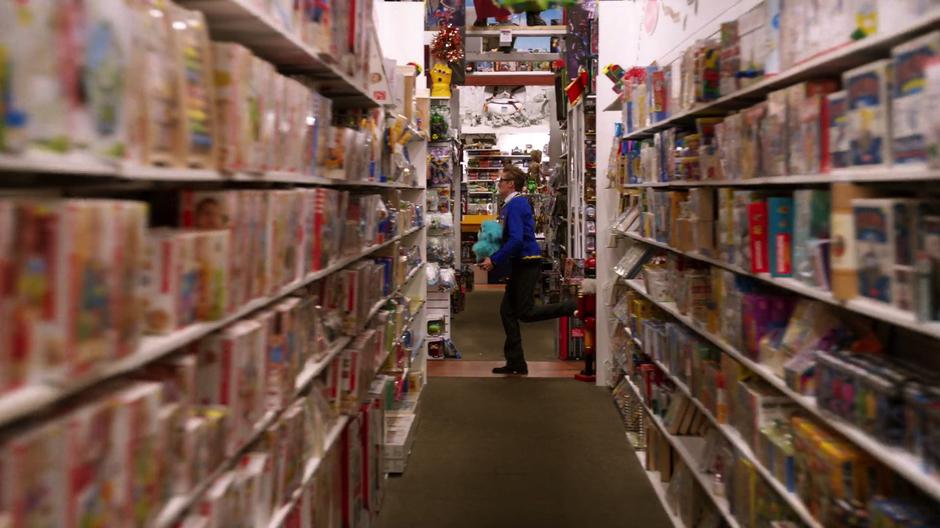 Young Stein runs down the aisles away from the angry crowd.