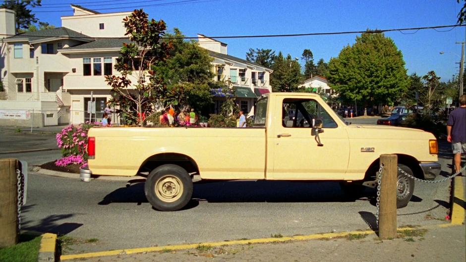 Henry pulls up in his truck.