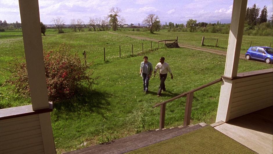 Shawn and Gus walk over to the farmhouse from the Blueberry.