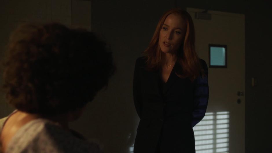 Scully asks Judy Poundstone to drop her act.