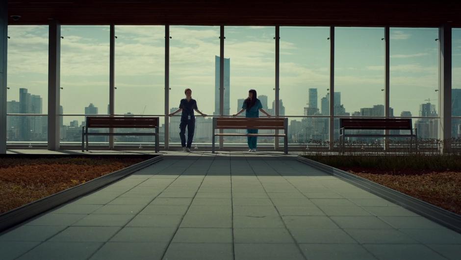 Mary and Annie talk on the roof garden.