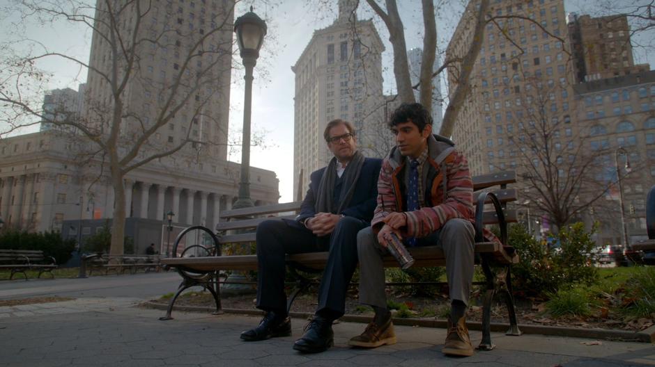 Bulls sits down on a bench in the park next to Jace Rundle.