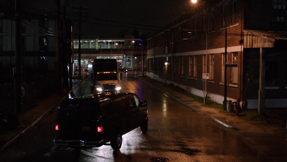 Diggle swerves around the corner in front of another truck.