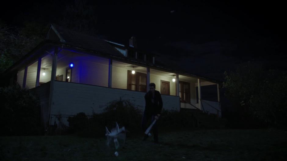 Mulder smashes the small drone with his bat.