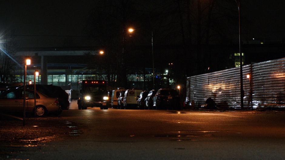 The police transport drives down the street.