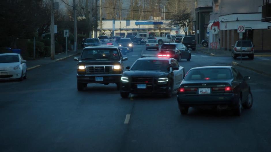 Officer Eggers weaves through traffic.