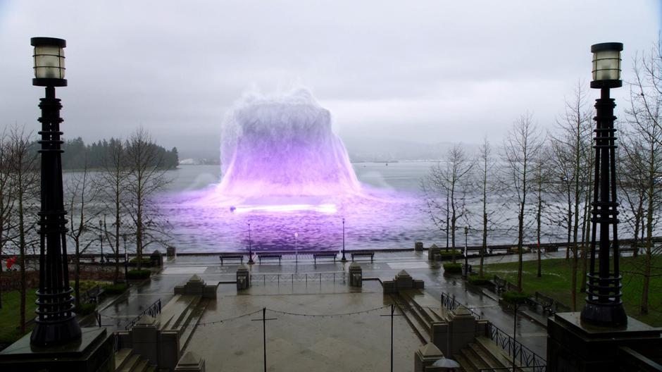 Iris uses her speed to build up a tidal wave in the bay approaching the park.