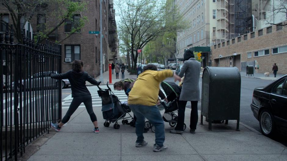 The Whizzer finds his path blocked by several women with strollers.