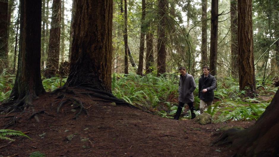 Ralph and Barry discuss strategy while walking through the forest looking for Edwin Gauss.