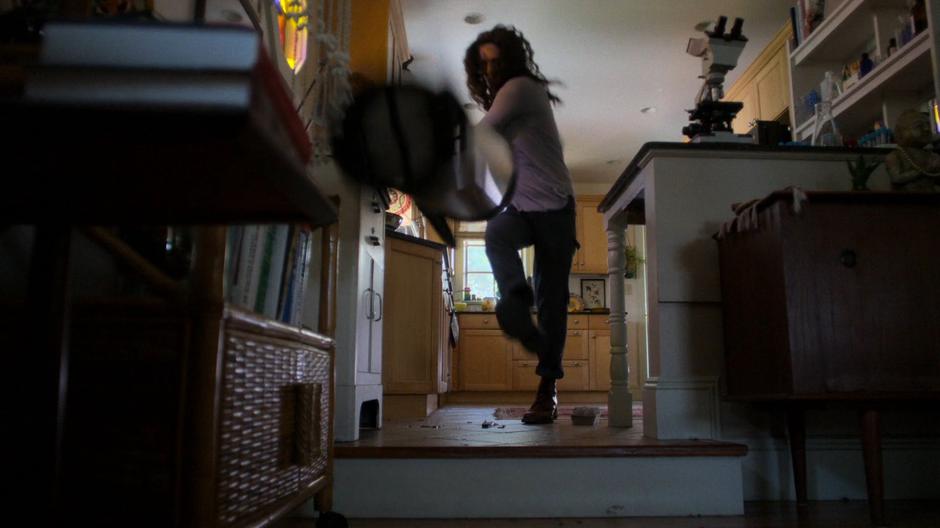 Alisa throws stuff around in the kitchen after getting frustrated.