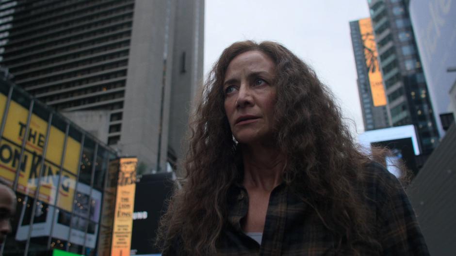 Alisa wanders through busy Times Square.