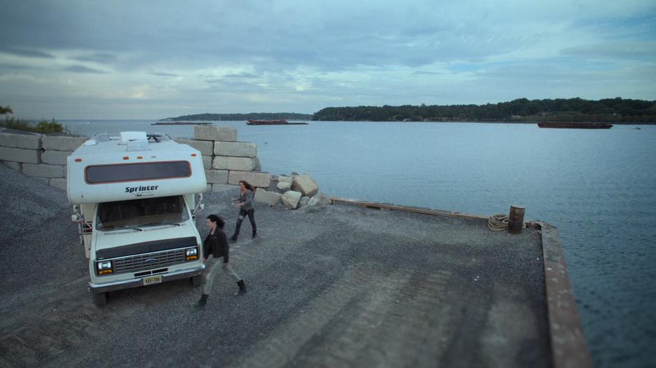 Jessica and Alisa return to the RV to flee.