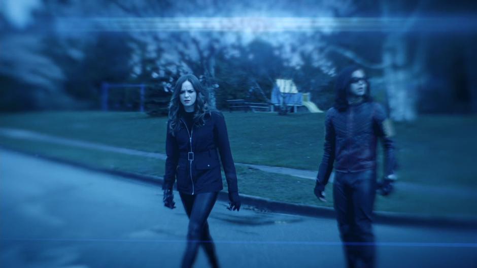 Caitlin looks around after appearing in the memory with Cisco.