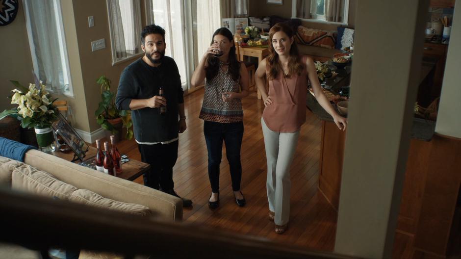 Dave, Carmen, and Hannah watch the stairs for the throuple.