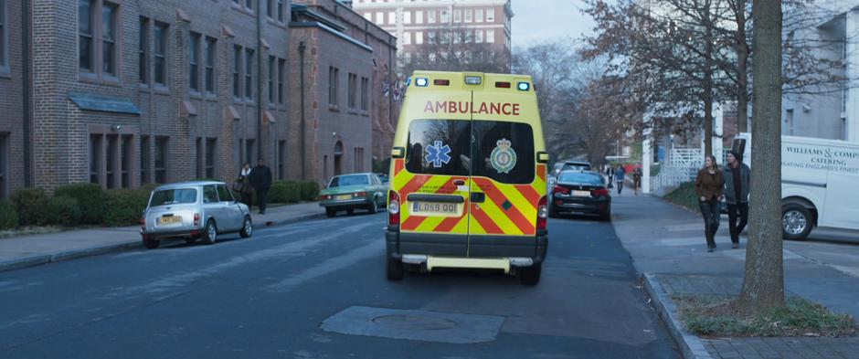 The ambulance drives off after the heist.