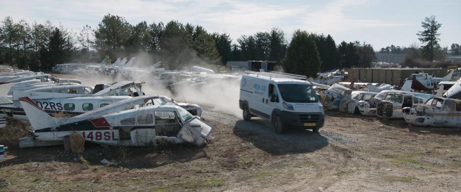 The gang's van pulls into the airplane graveyard.