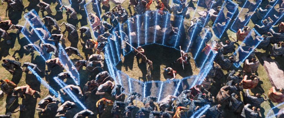 A small group of Dora Milaje find themselves surrounded by the Border Tribe's shields.