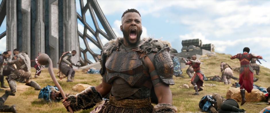 M'Baku yells out to his people while fighting.