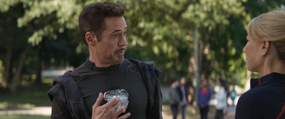 Tony pokes at his arc creator while talking with Pepper.