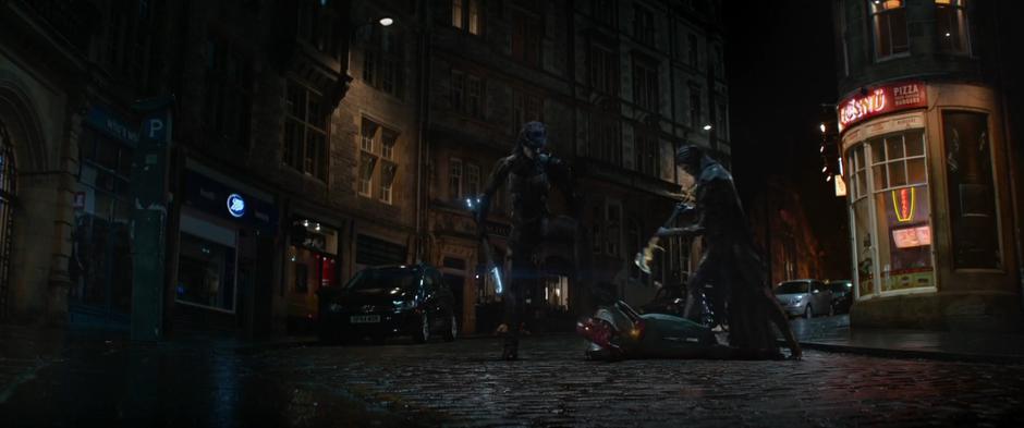 Proxima Midnight and Corvus Glaive hit Vision while he is on the ground.