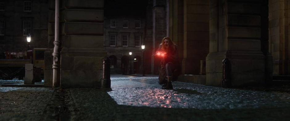 Wanda uses her powers to slow Vision's fall.