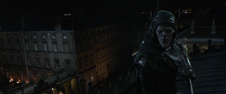 Corvus Glaive faces off against Vision on the roof.