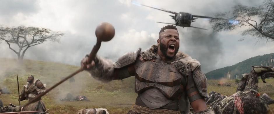 M'Baku yells out in the middle of the battle while a Wakandan fighter flies overhead.