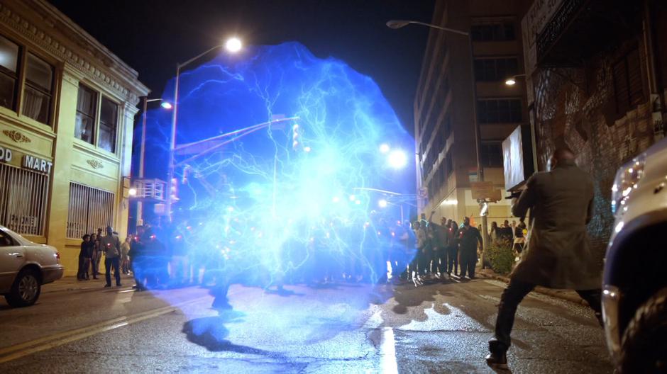 Jefferson uses his lightning shield to protect the marchers.